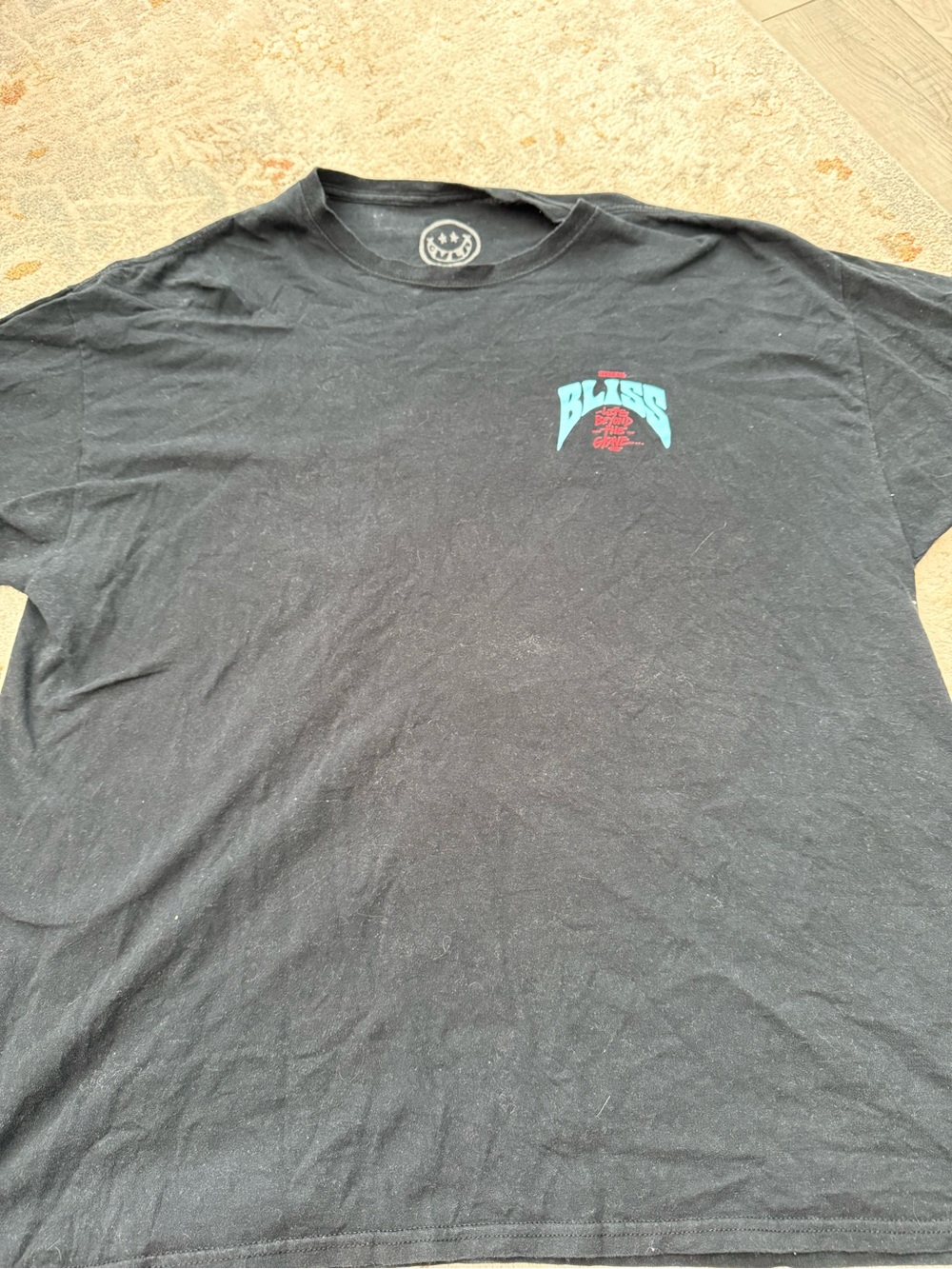 RVCA Black Short-Sleeve Tee with Turquoise and Red Chest Graphic